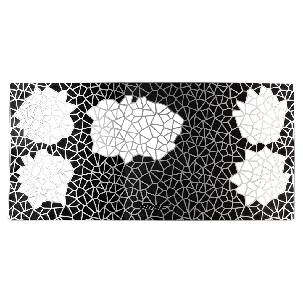 Custom stainless steel speaker grille with decorative geometric pattern.